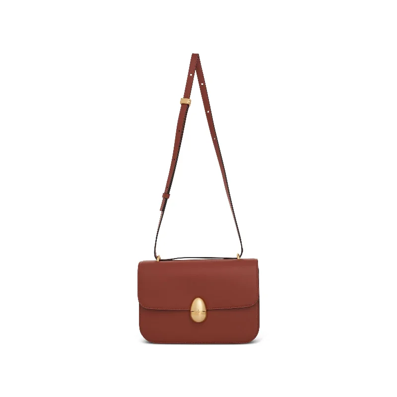 Quilted Leather Crossbody Bag in Cream for a Classic and Elegant AppearancePhoenix Crossbody Bag in Cognac